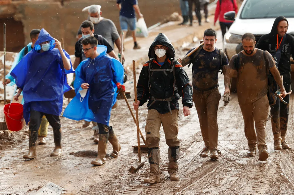 watch military unit rescues people as several bodies found in flood hit areas of valencia