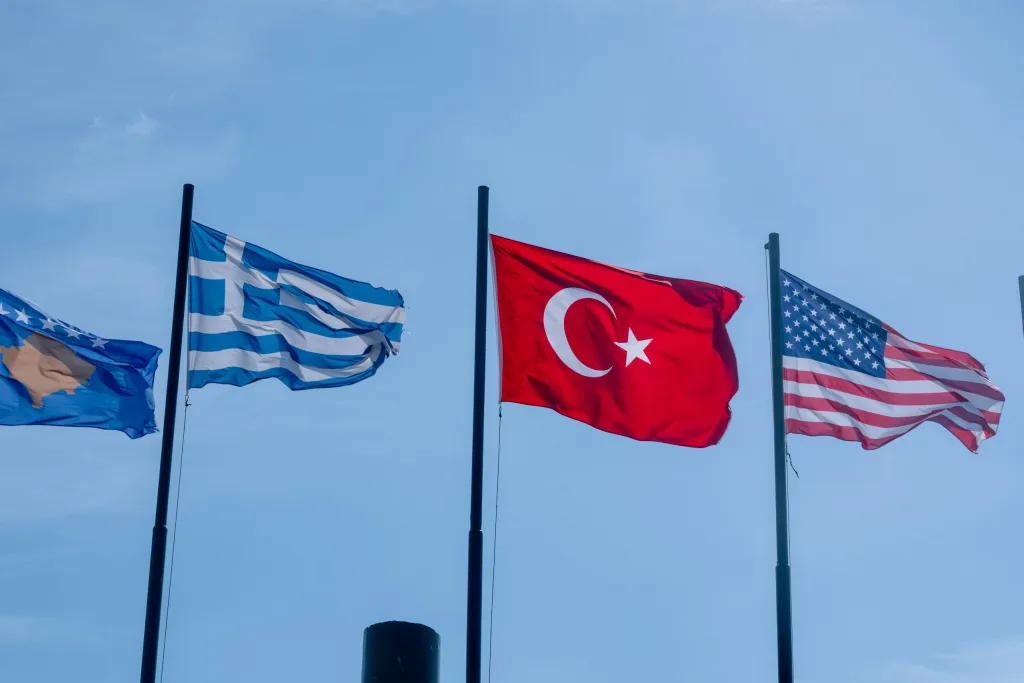 flags of kosovo greece turkey and usa waving stockpack unsplash